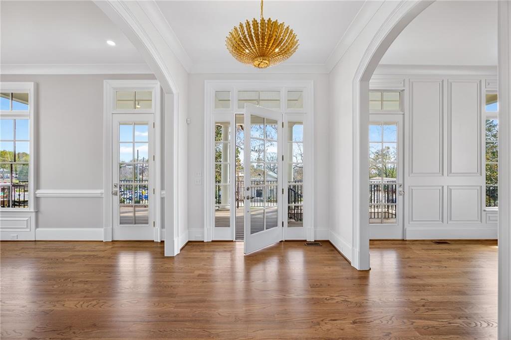 2147 Cooper Lake Road Southeast Smyrna, GA 30080 - Photo 2 of 65 a view of an empty room with window and wooden floor