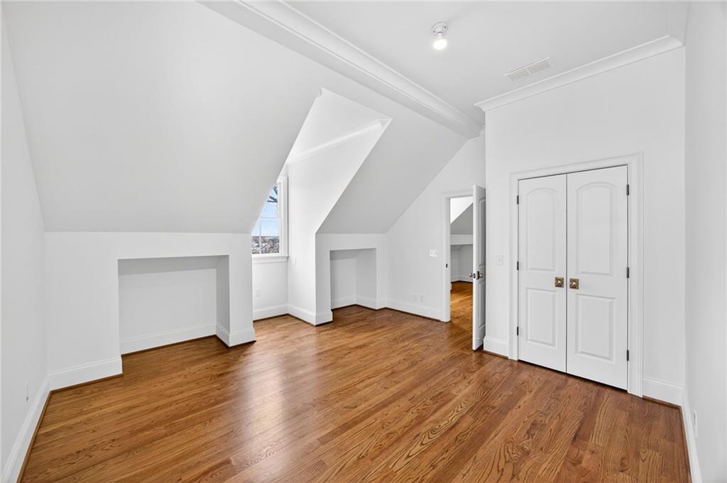 2147 Cooper Lake Road Southeast Smyrna, GA 30080 - Photo 32 of 65 a view of empty room with wooden floor