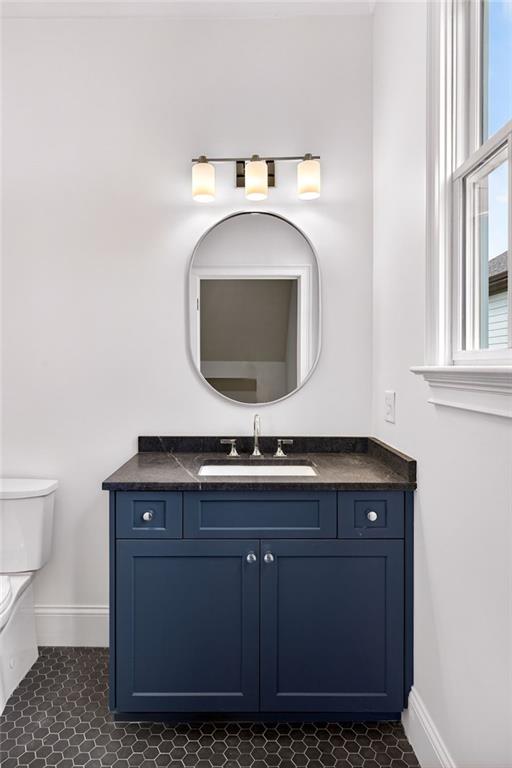 2147 Cooper Lake Road Southeast Smyrna, GA 30080 - Photo 34 of 65 a bathroom with a sink and a mirror