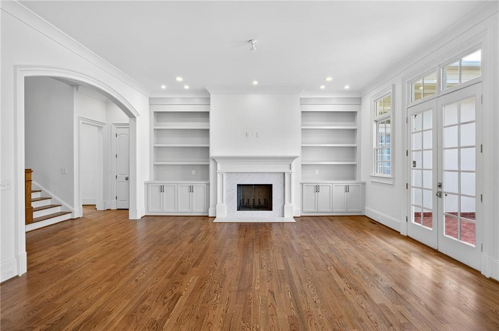 2147 Cooper Lake Road Southeast Smyrna, GA 30080 - Photo 4 of 65 a view of a room with cabinet and a fireplace