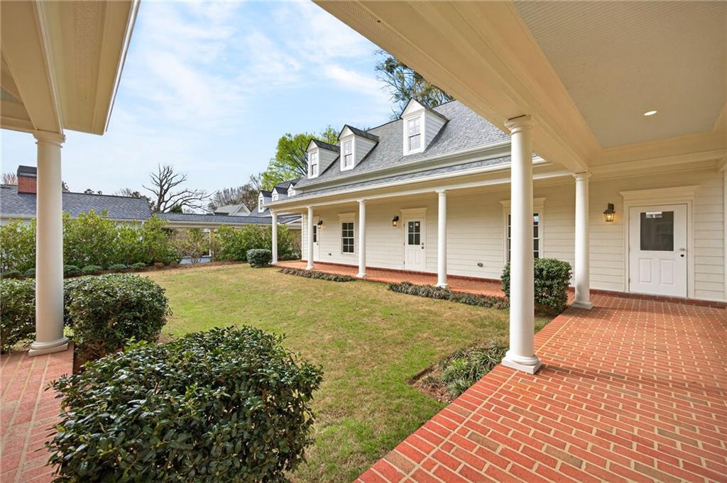 2147 Cooper Lake Road Southeast Smyrna, GA 30080 - Photo 58 of 65 a view of a house with backyard and porch