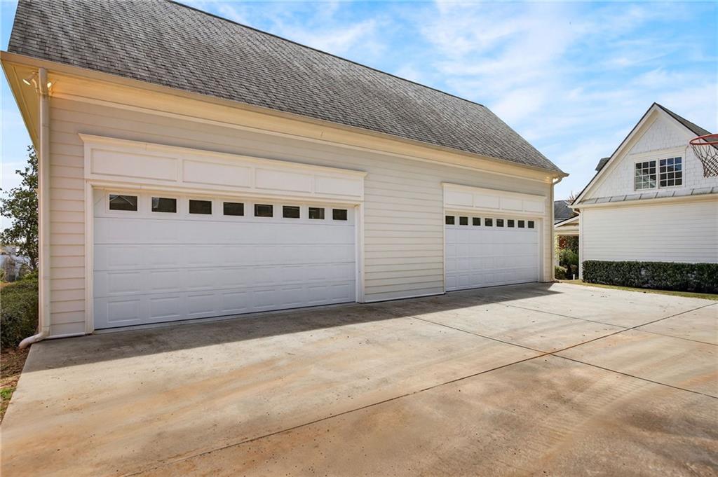 2147 Cooper Lake Road Southeast Smyrna, GA 30080 - Photo 63 of 65 a view of a house with garage