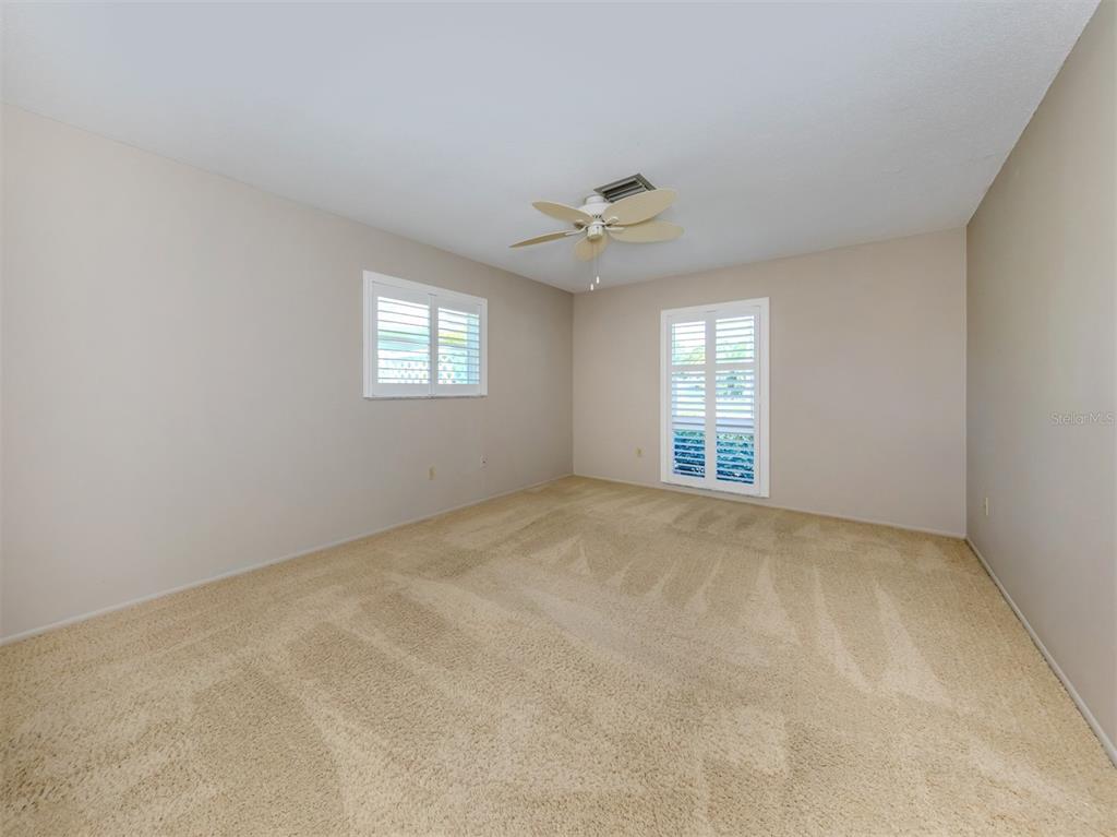 1224 Pine Needle Road Venice, FL 34285 - Photo 34 of 94 Large 2nd Bedroom also has a walk in closet