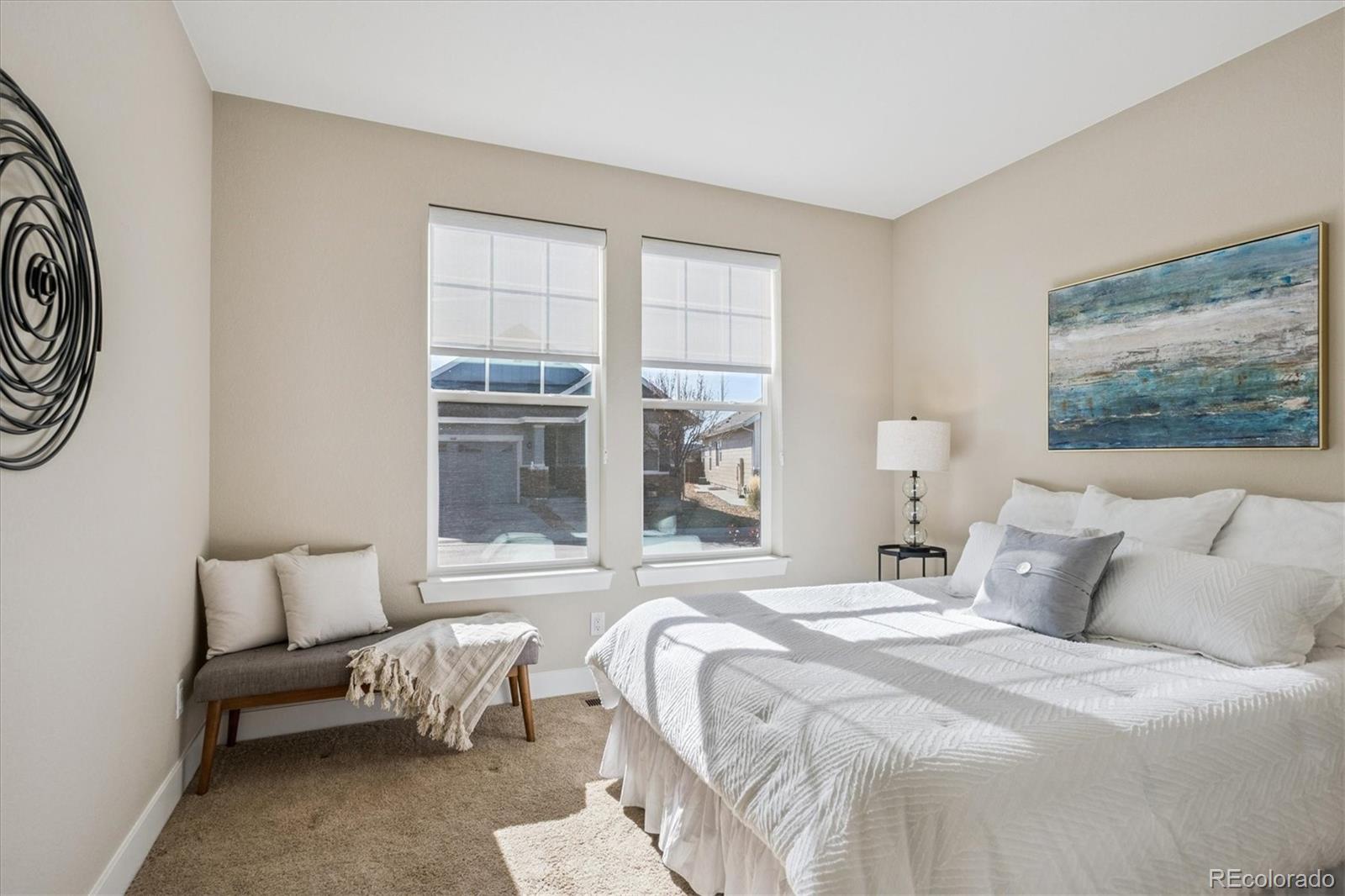 6667 Club Villa Road Parker, CO 80134 - Photo 28 of 50 a bedroom with bed and a large window