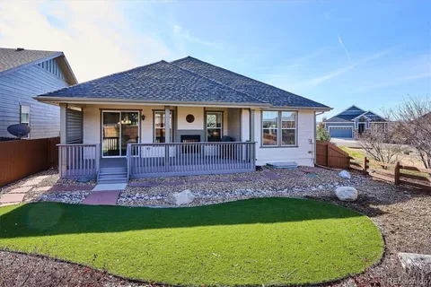 a view of house with a garden