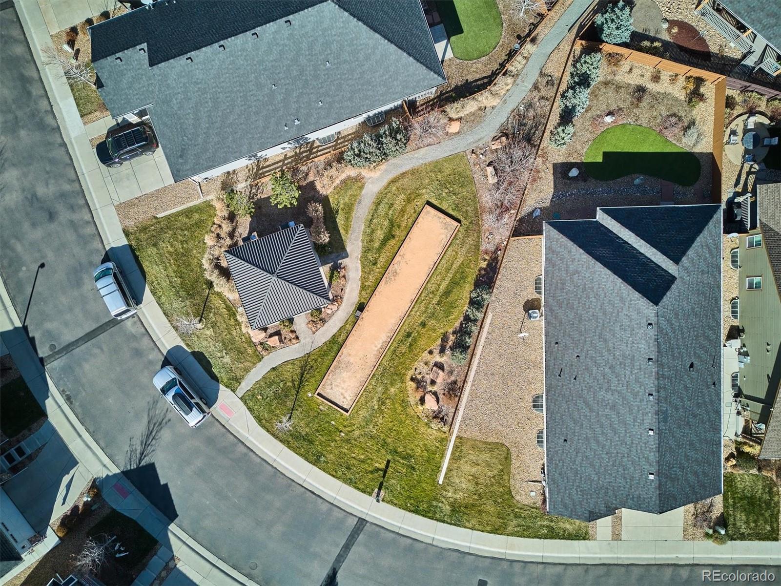 6667 Club Villa Road Parker, CO 80134 - Photo 43 of 50 an aerial view of a house with a garden