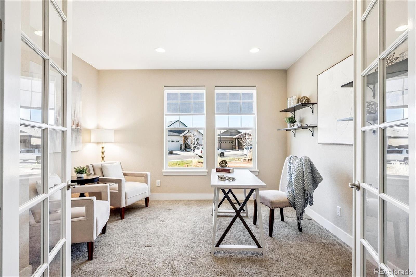6667 Club Villa Road Parker, CO 80134 - Photo 5 of 50 a living room with furniture and a window