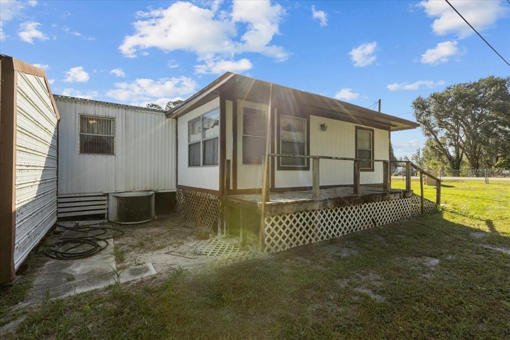 Undisclosed Address Bronson, FL 32621 - Photo 27 of 35 a view of a house with a yard