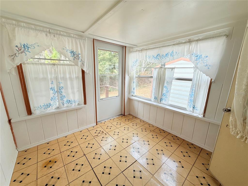 Undisclosed Address Bronson, FL 32621 - Photo 7 of 35 a bedroom with a bed and a window