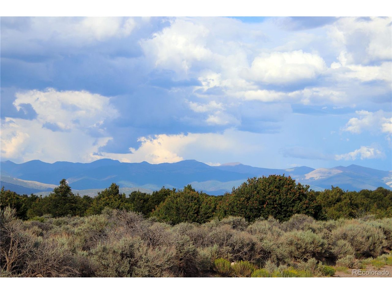 5 North Canyon Road San Luis, CO 81152 - Photo 4 of 25 a view of a city and trees