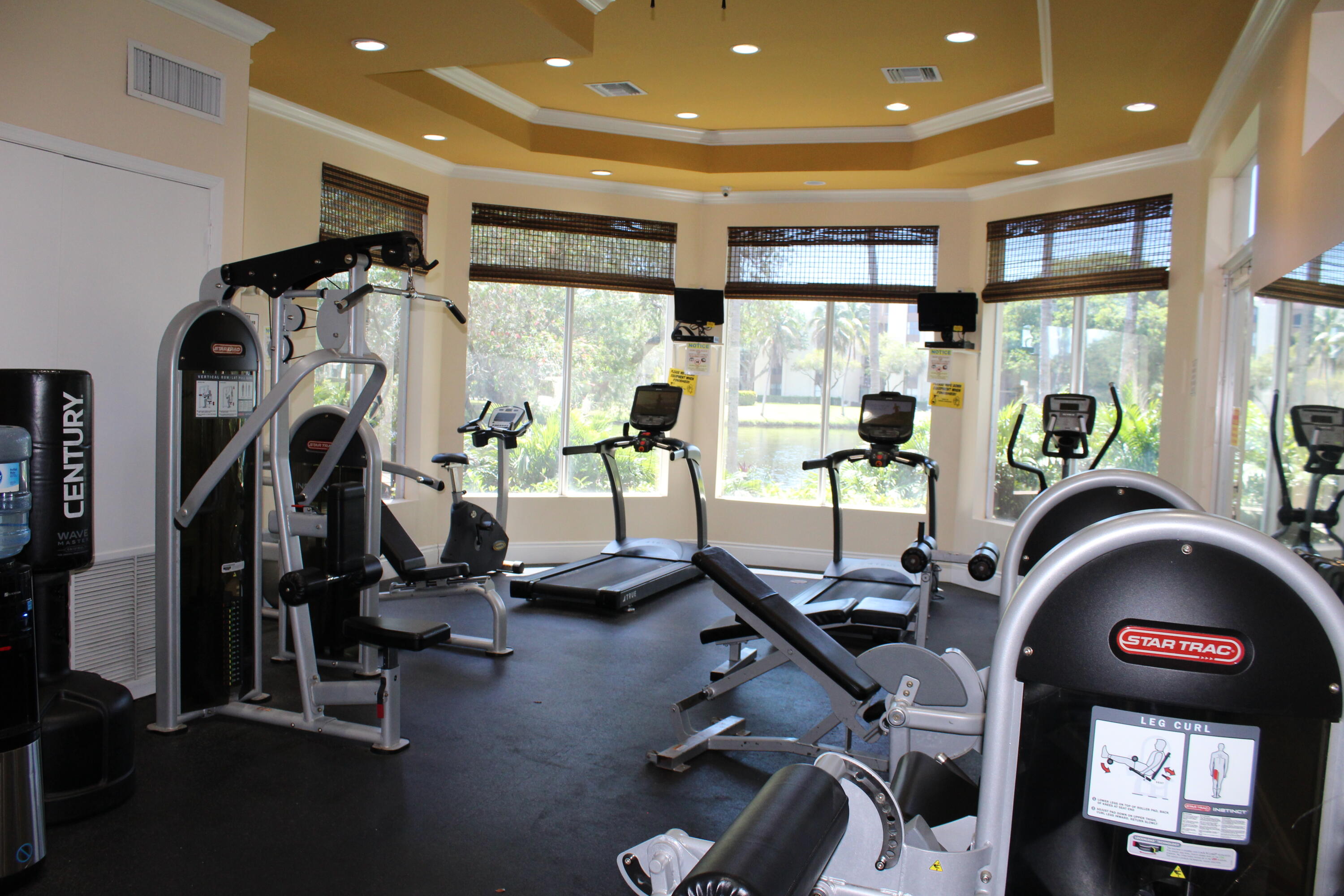 1915 Lavers Circle, Unit E209 Delray Beach, FL 33444 - Photo 7 of 20 a view of a room with gym equipment
