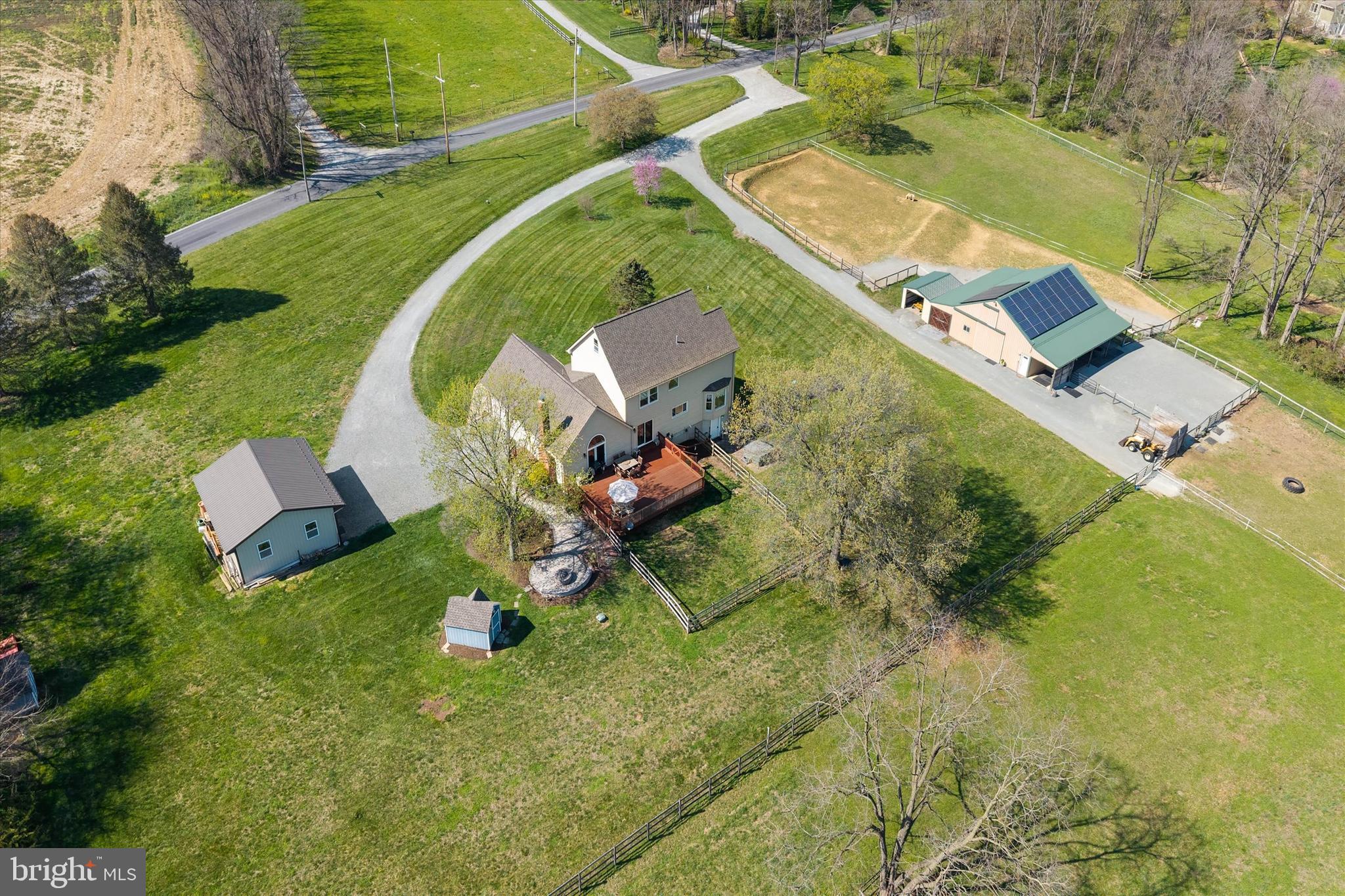 4012 Homeville Road Cochranville, PA 19330 - Photo 33 of 57 an aerial view of residential house with outdoor space and parking