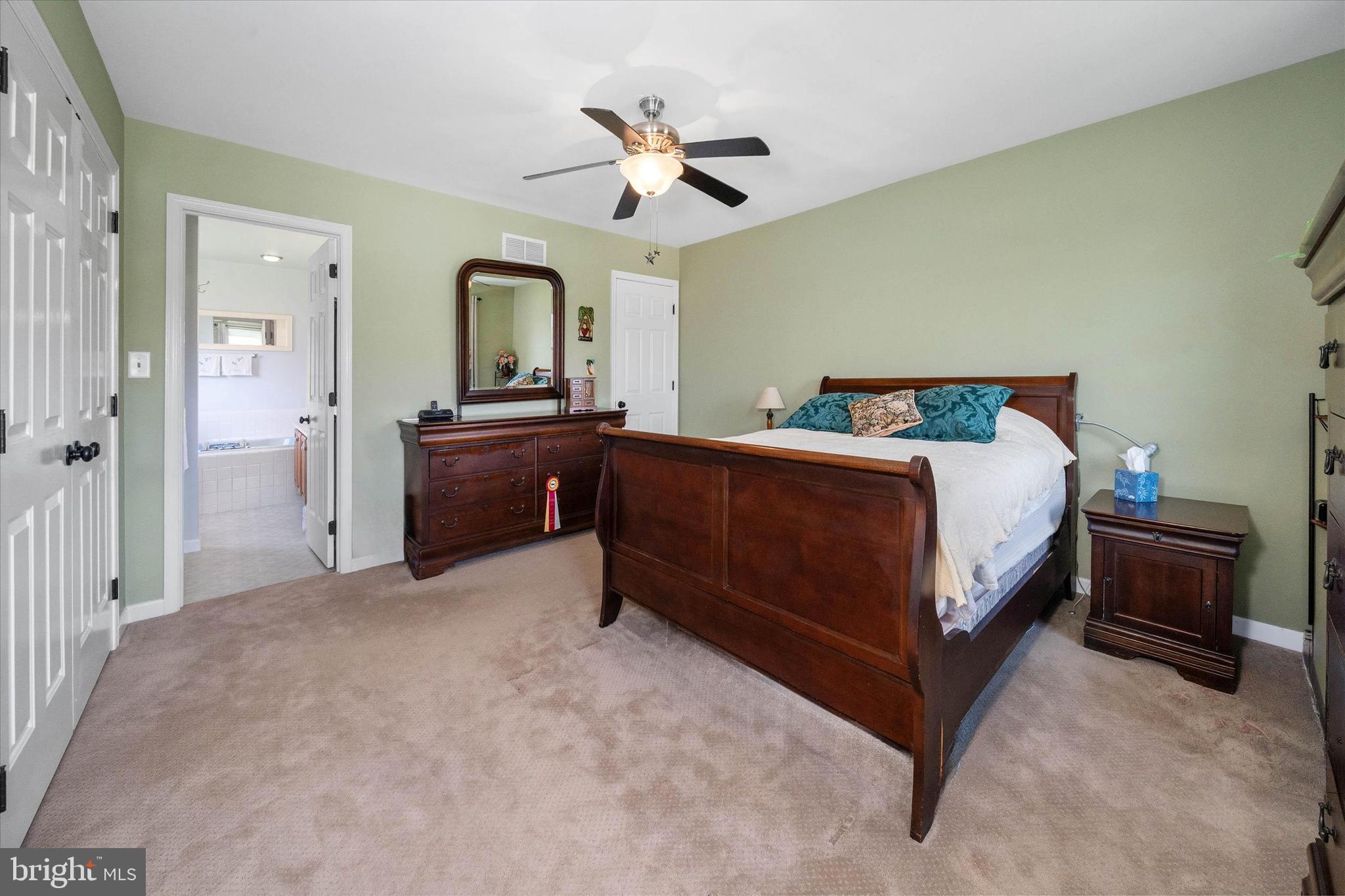 4012 Homeville Road Cochranville, PA 19330 - Photo 44 of 57 a bedroom with a bed and a dresser