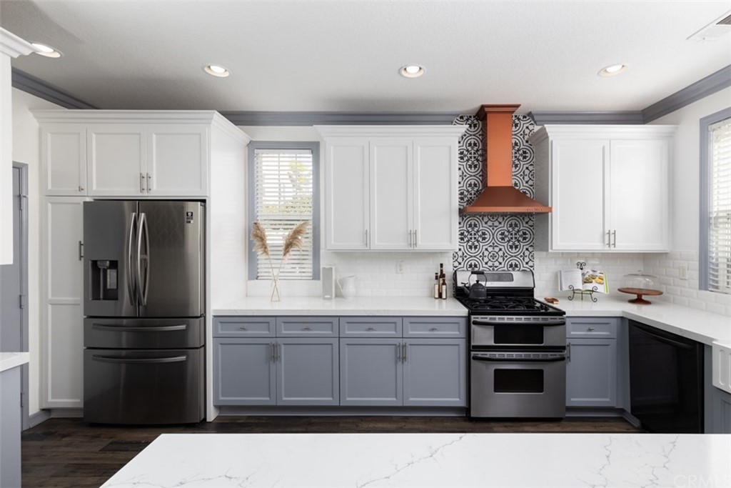 9 Thorp Ladera Ranch Ladera Ranch, CA 92694 - Photo 1 of 34 a kitchen with a sink stainless steel appliances and cabinets