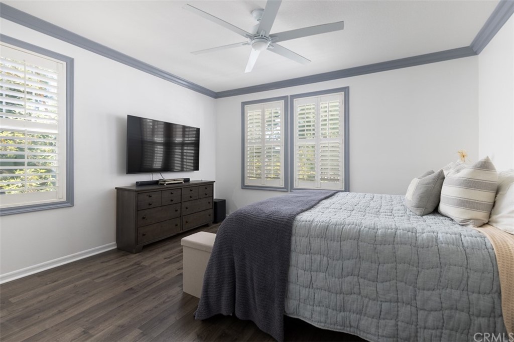 9 Thorp Ladera Ranch Ladera Ranch, CA 92694 - Photo 14 of 34 a bedroom with a bed television on desk and a window