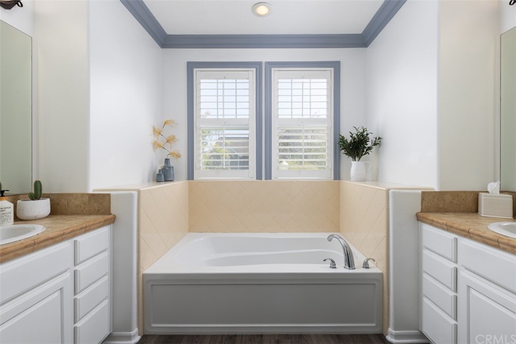 9 Thorp Ladera Ranch Ladera Ranch, CA 92694 - Photo 15 of 34 a bathroom with a tub a sink and window