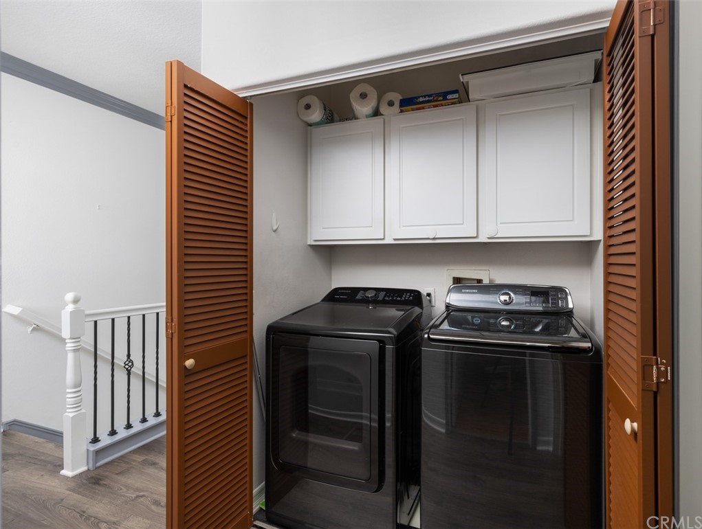 9 Thorp Ladera Ranch Ladera Ranch, CA 92694 - Photo 21 of 34 a kitchen with a stove and a cabinet
