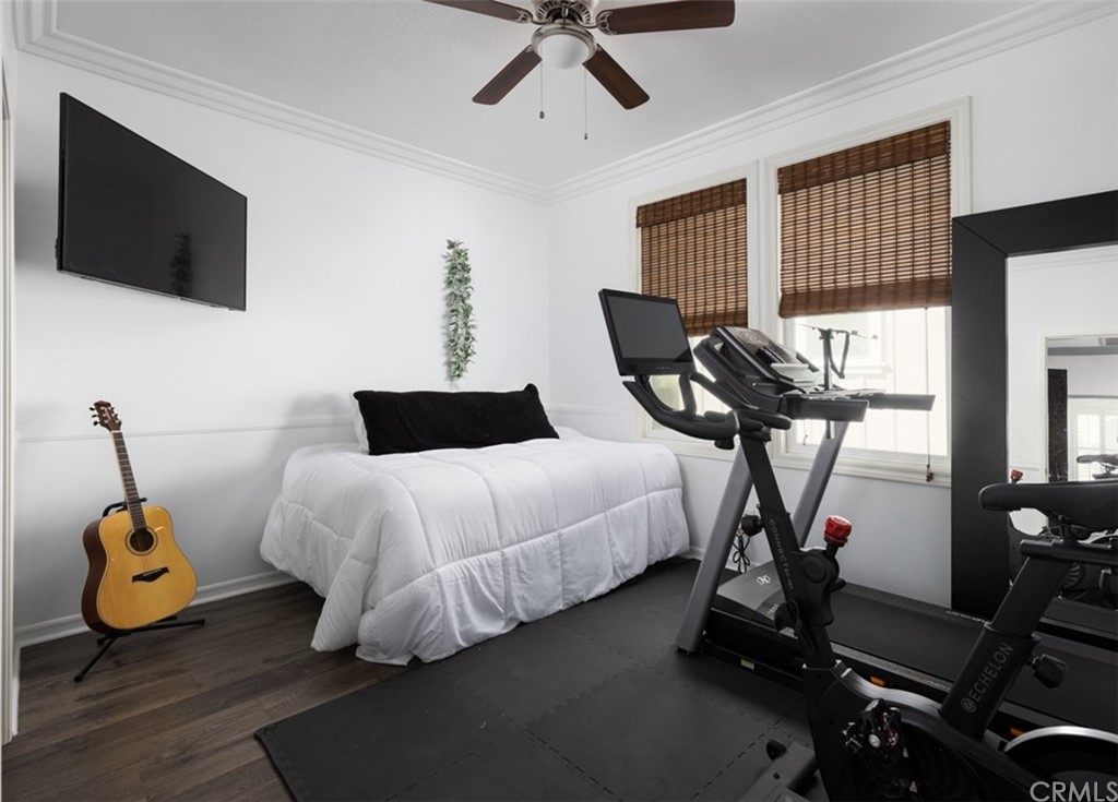 9 Thorp Ladera Ranch Ladera Ranch, CA 92694 - Photo 22 of 34 a bedroom with bed and glass door