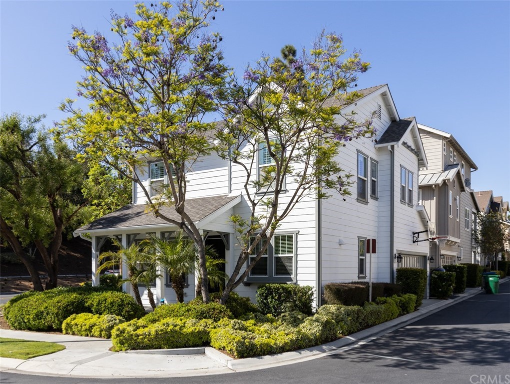 9 Thorp Ladera Ranch Ladera Ranch, CA 92694 - Photo 28 of 34 a front view of a house with a yard