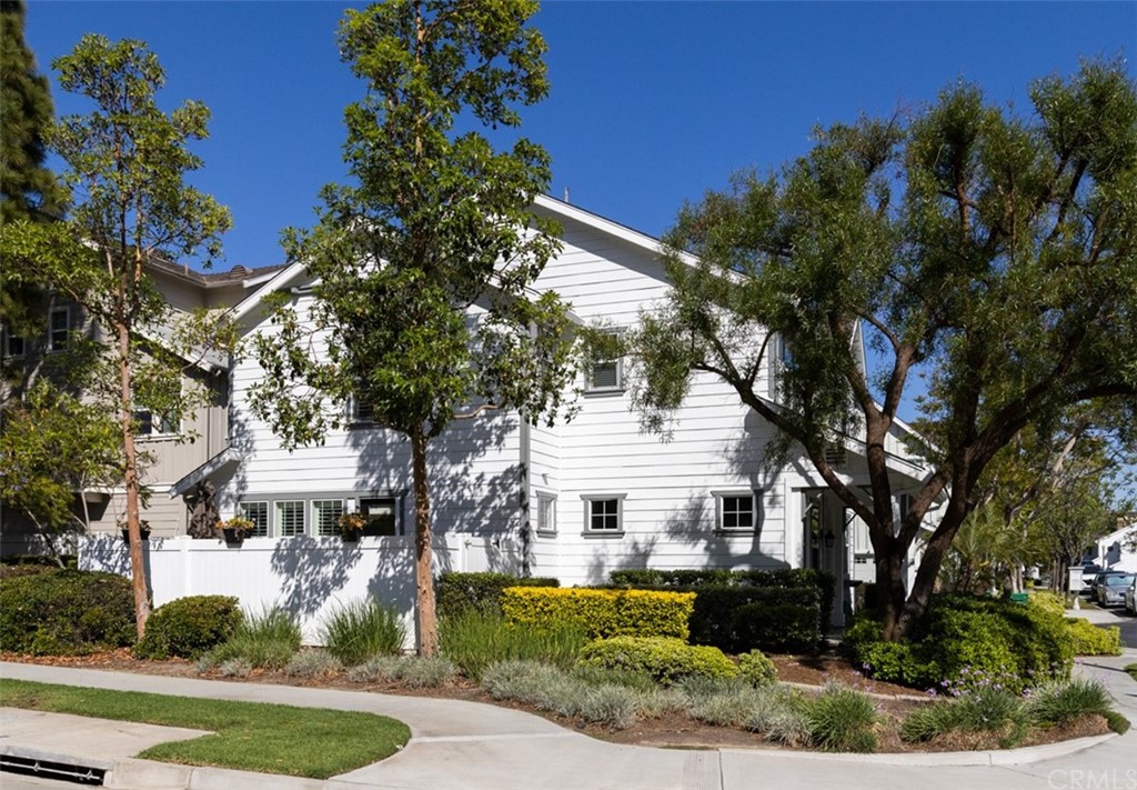 9 Thorp Ladera Ranch Ladera Ranch, CA 92694 - Photo 29 of 34 a view of a white house with a yard and plants