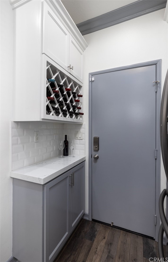 9 Thorp Ladera Ranch Ladera Ranch, CA 92694 - Photo 5 of 34 a view of a storage and utility room with wooden floor