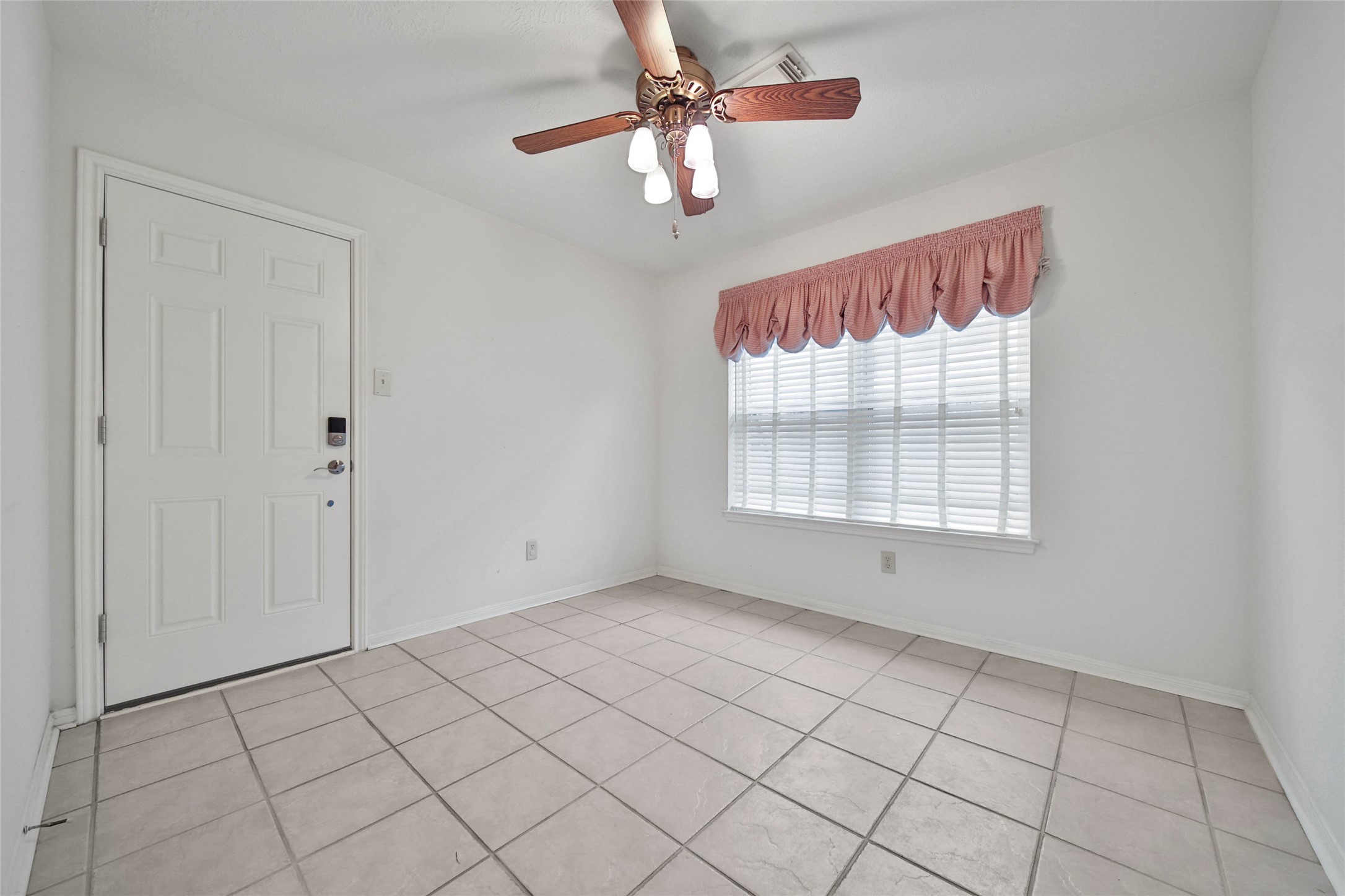 5010 Cupids Bower Court Spring, TX 77388 - Photo 11 of 40 a view of an empty room with a window