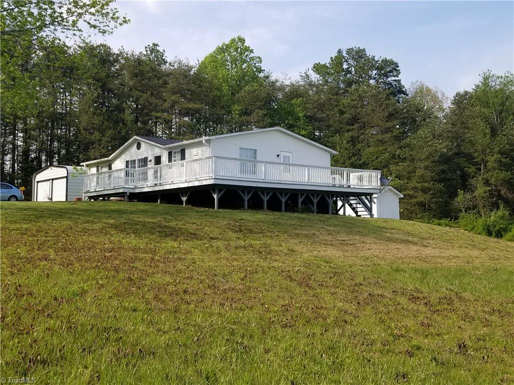 1309 Gordon Road Pinnacle, NC 27043 - Photo 12 of 41 View facing front and side deck
