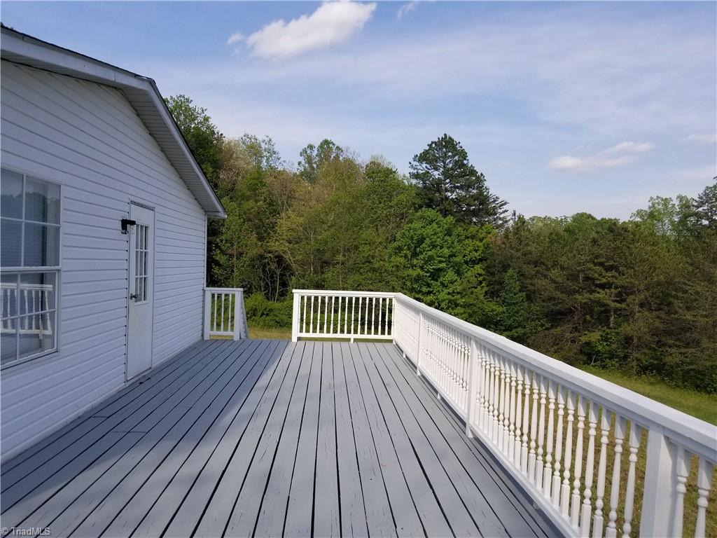 1309 Gordon Road Pinnacle, NC 27043 - Photo 16 of 41 View of side deck just off of the kitchen