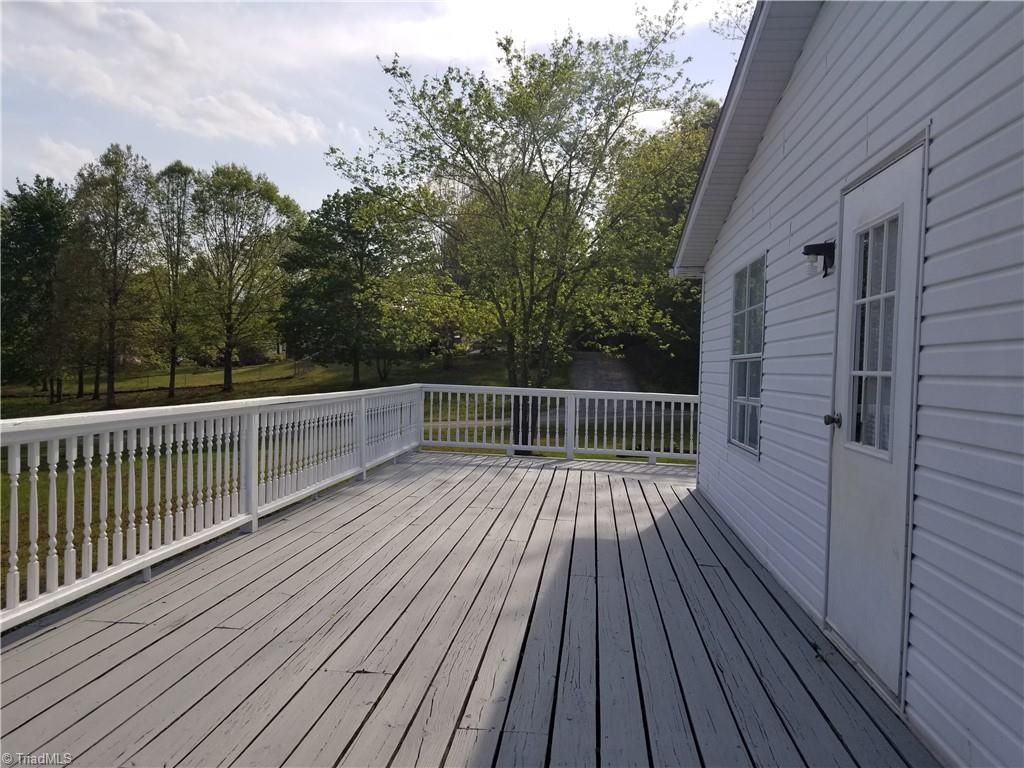 1309 Gordon Road Pinnacle, NC 27043 - Photo 18 of 41 Another view of side deck facing toward the front yard