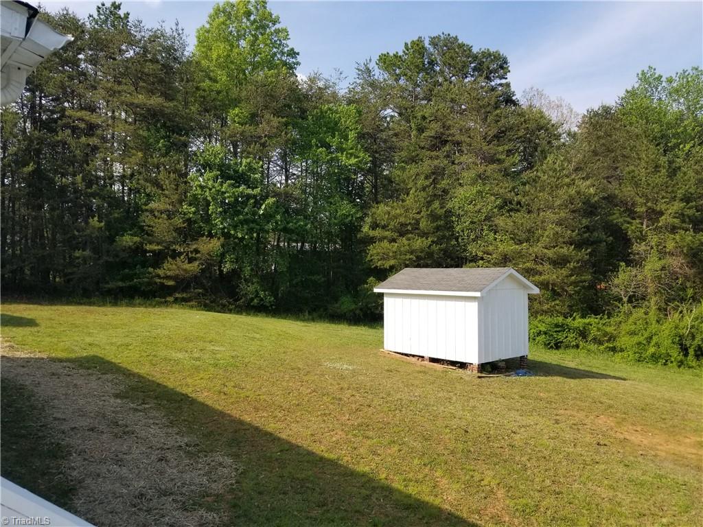 1309 Gordon Road Pinnacle, NC 27043 - Photo 34 of 41 View facing back yard and 14 x 10 storage building