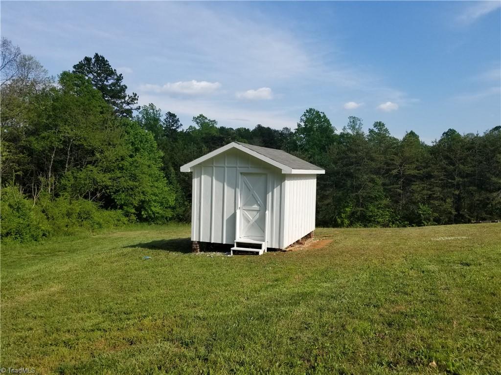 1309 Gordon Road Pinnacle, NC 27043 - Photo 35 of 41 Front view of 14 x 10 storage building