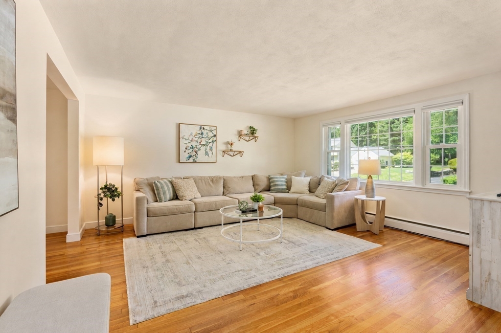 11 Longmeadow Road Medfield, MA 02052 - Photo 4 of 39 a living room with furniture and a large window