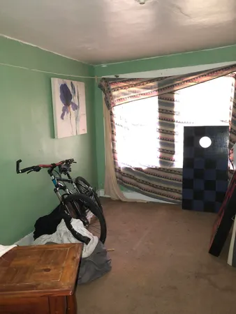 a room with furniture and a window