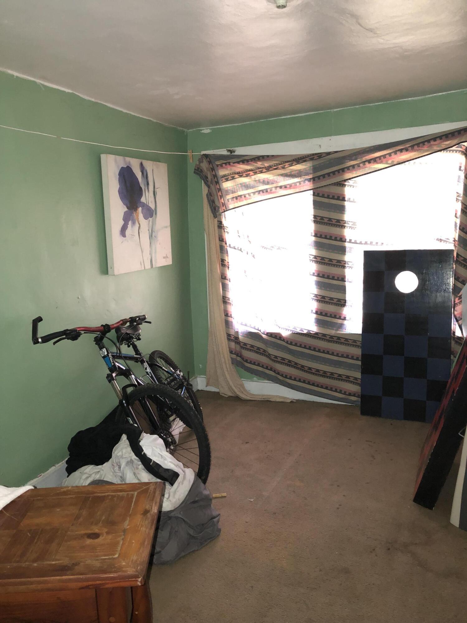 400 12th Street Selma, VA 24474 - Photo 13 of 16 a room with furniture and a window
