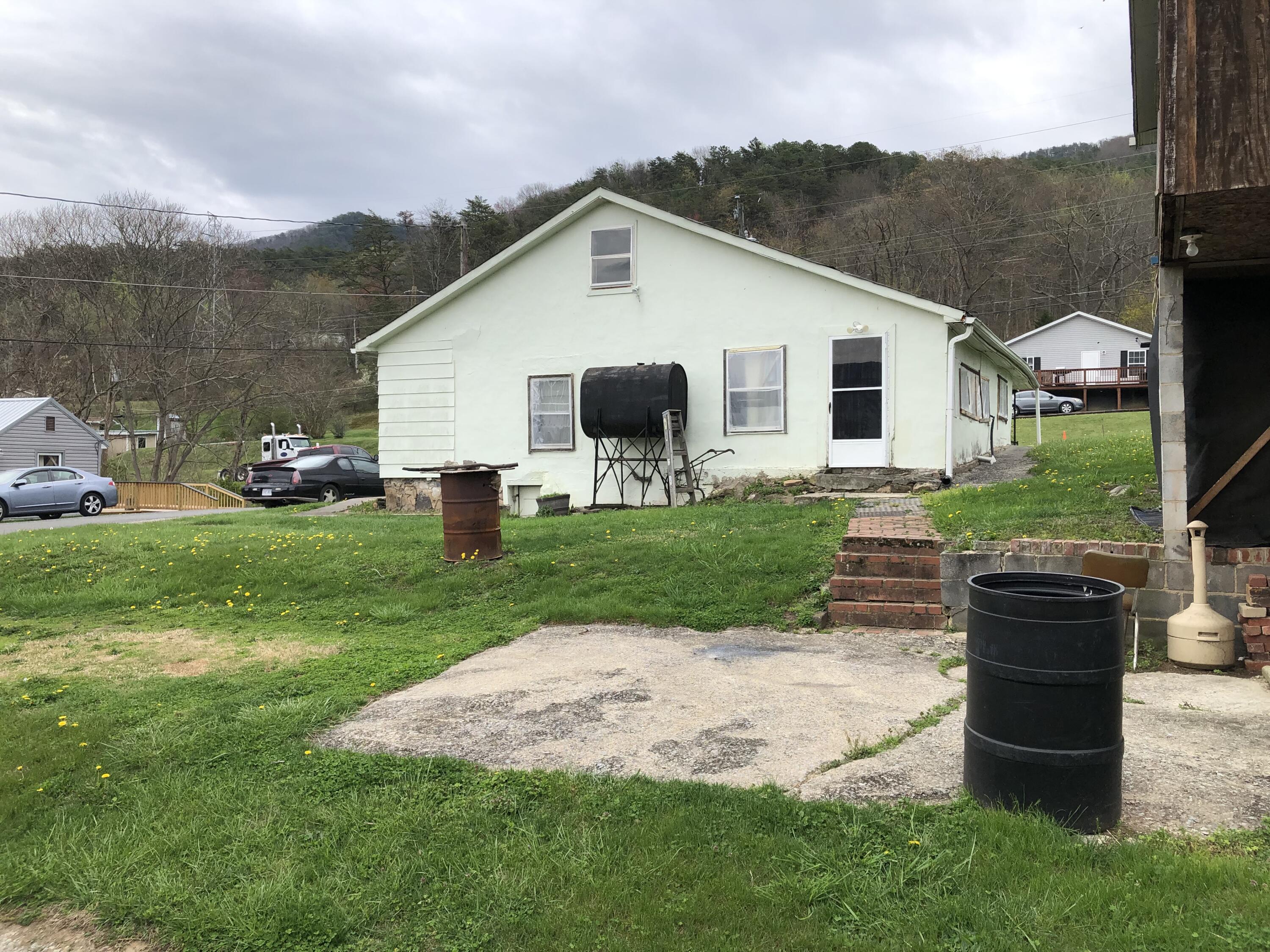 400 12th Street Selma, VA 24474 - Photo 6 of 16 a view of a house with a yard and sitting area