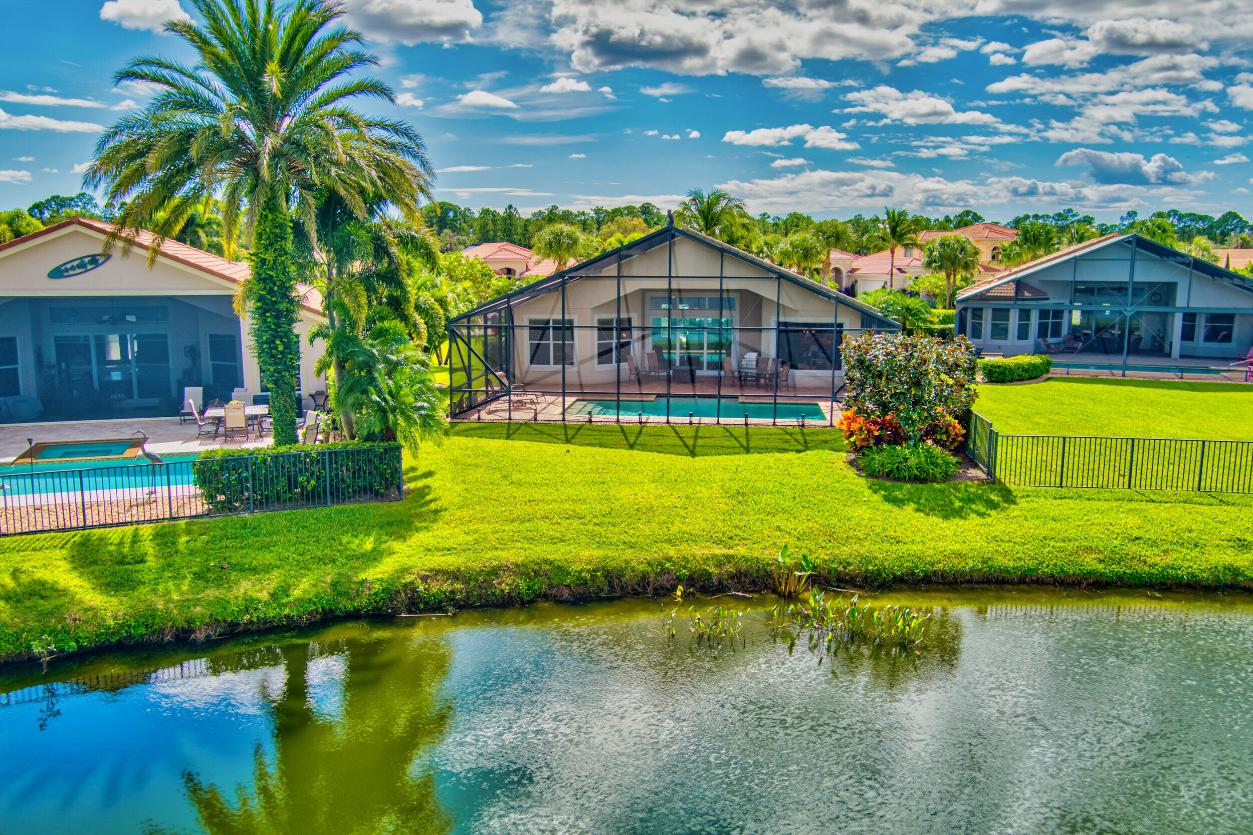 237 Carina Drive Jupiter, FL 33478 - Photo 5 of 73 a view of a house with a yard