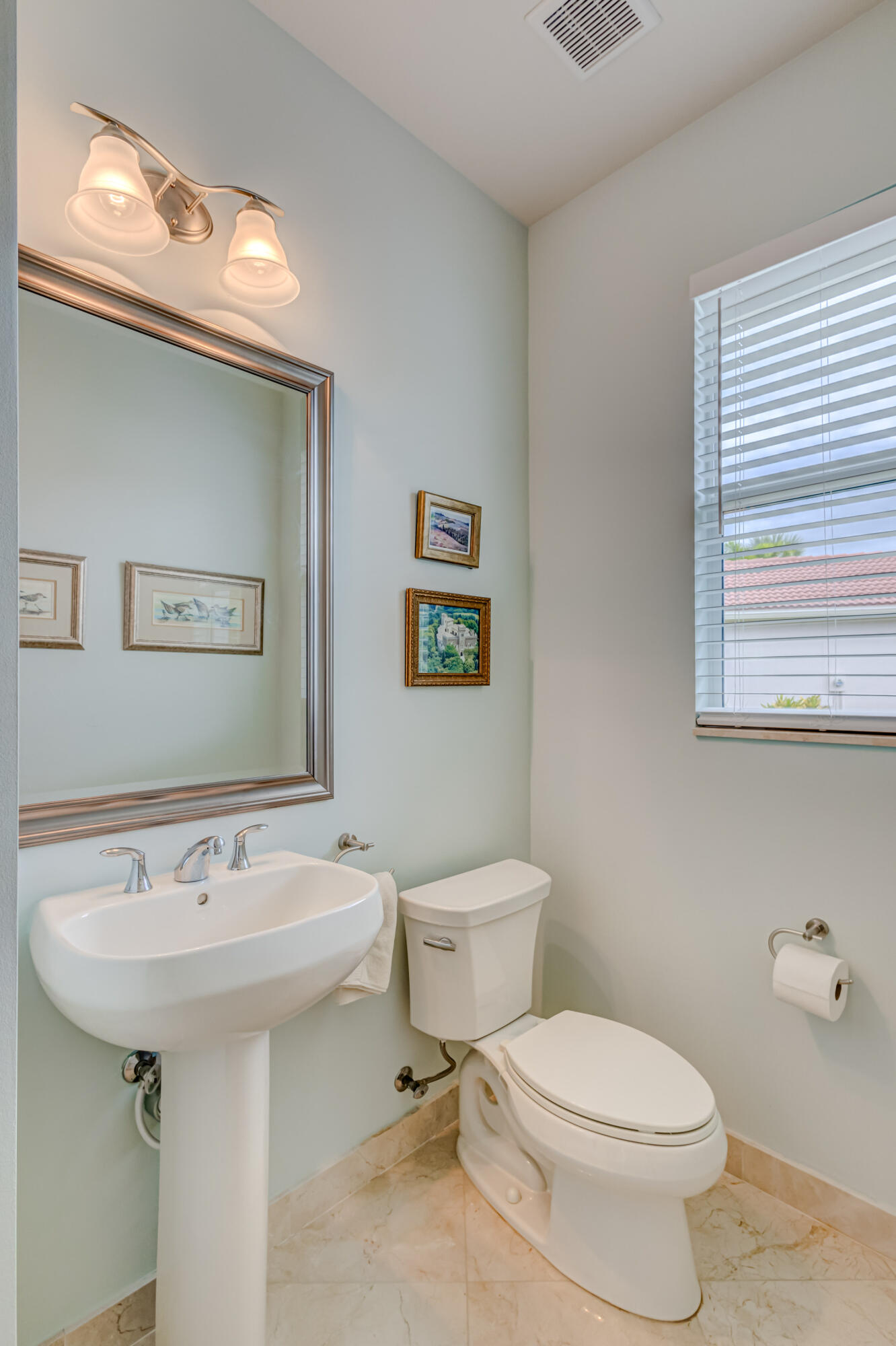 237 Carina Drive Jupiter, FL 33478 - Photo 53 of 73 a bathroom with a sink and a toilet