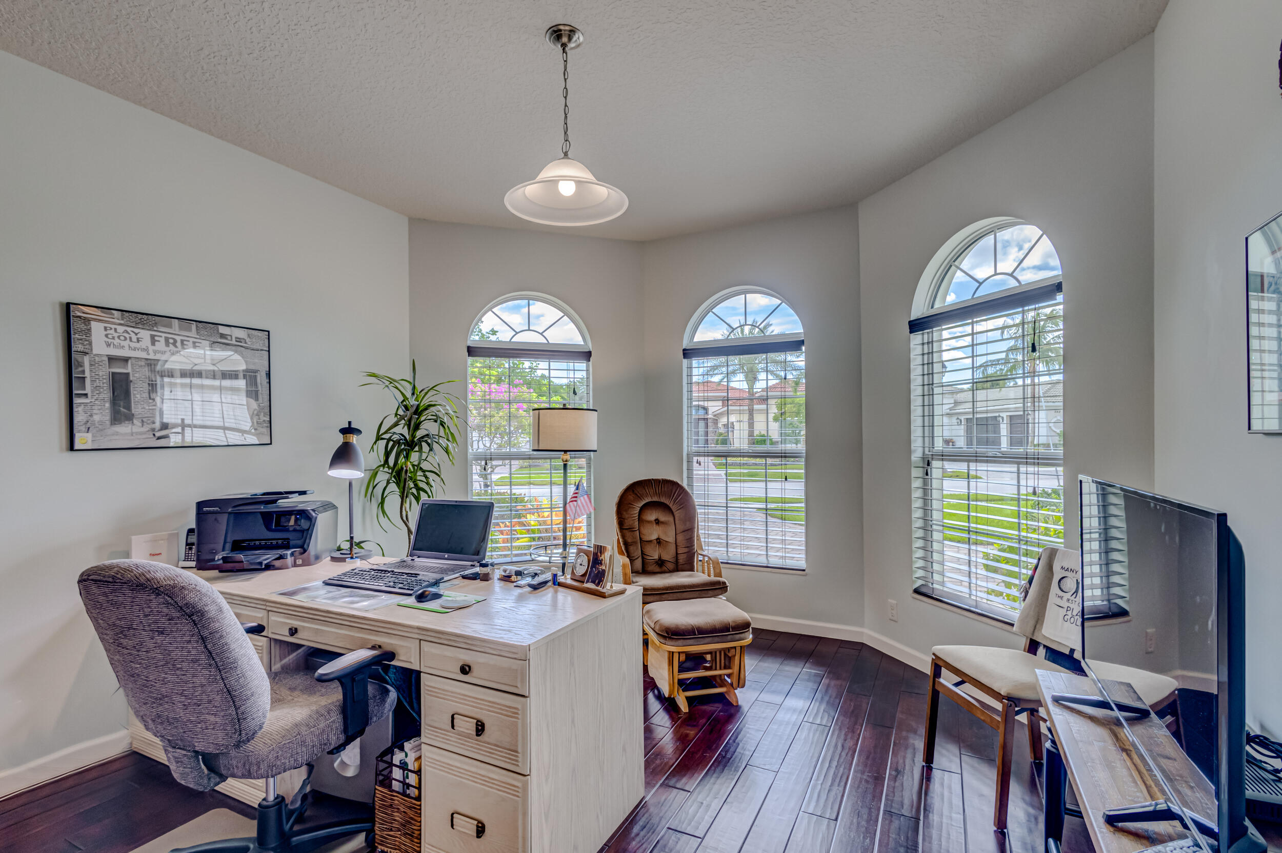 237 Carina Drive Jupiter, FL 33478 - Photo 55 of 73 a view of a dining room with furniture window and wooden floor