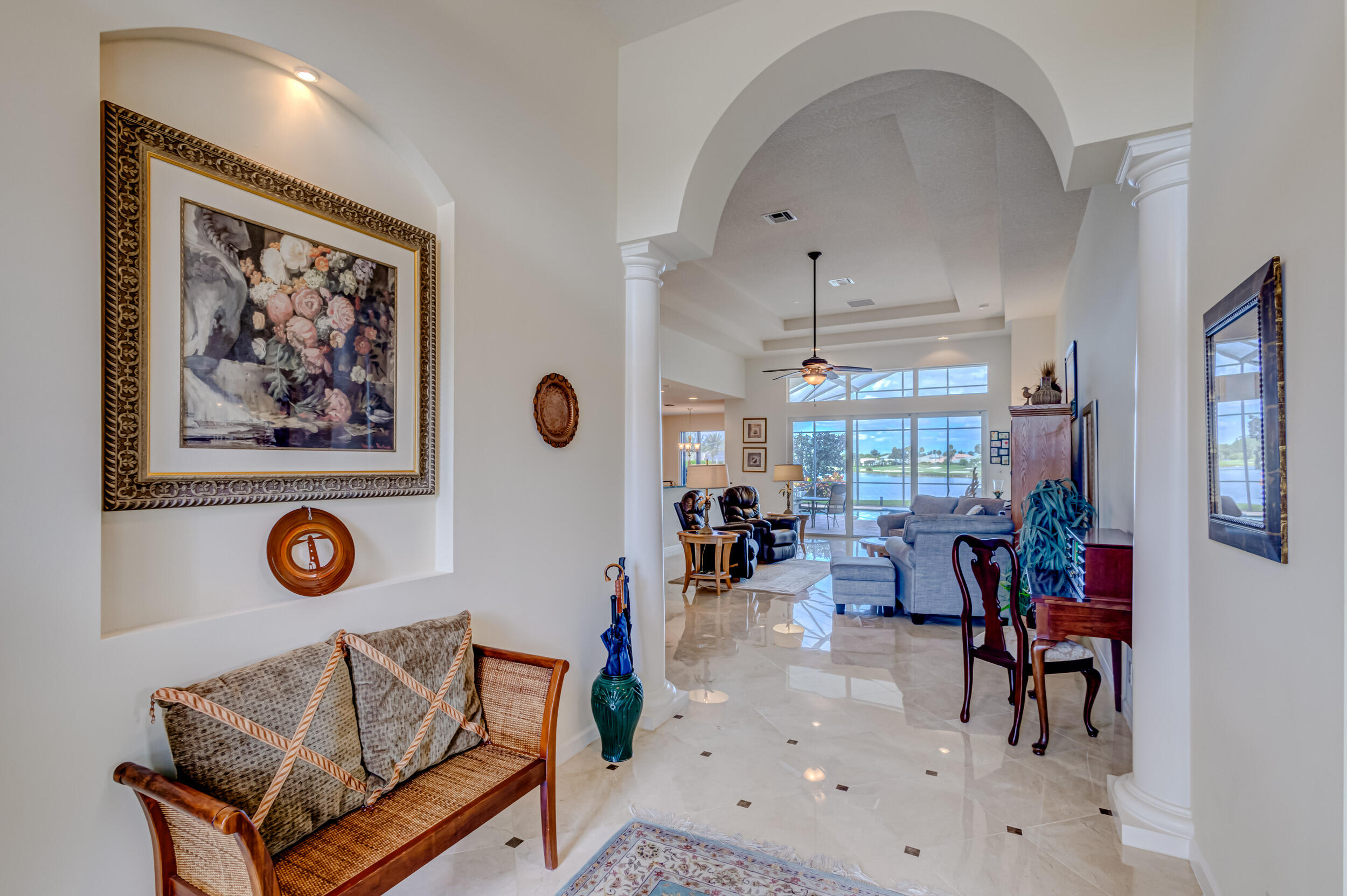 237 Carina Drive Jupiter, FL 33478 - Photo 71 of 73 a living room with furniture and a window