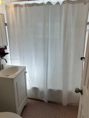 a bathroom with a sink and a vanity