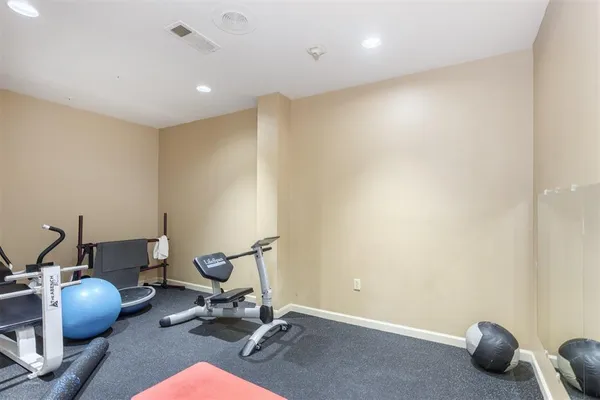 a view of a room with gym equipment