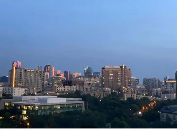 a view of a city with tall buildings in the background