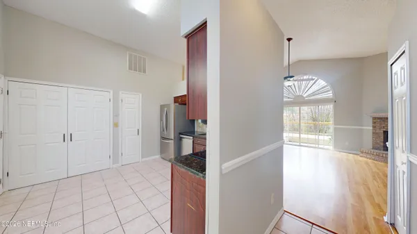 a view of an empty room and window