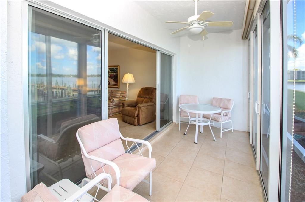 1868 Southwest Palm City Road, Unit 105 Stuart, FL 34994 - Photo 27 of 48 Entrance back to Living Room from Patio