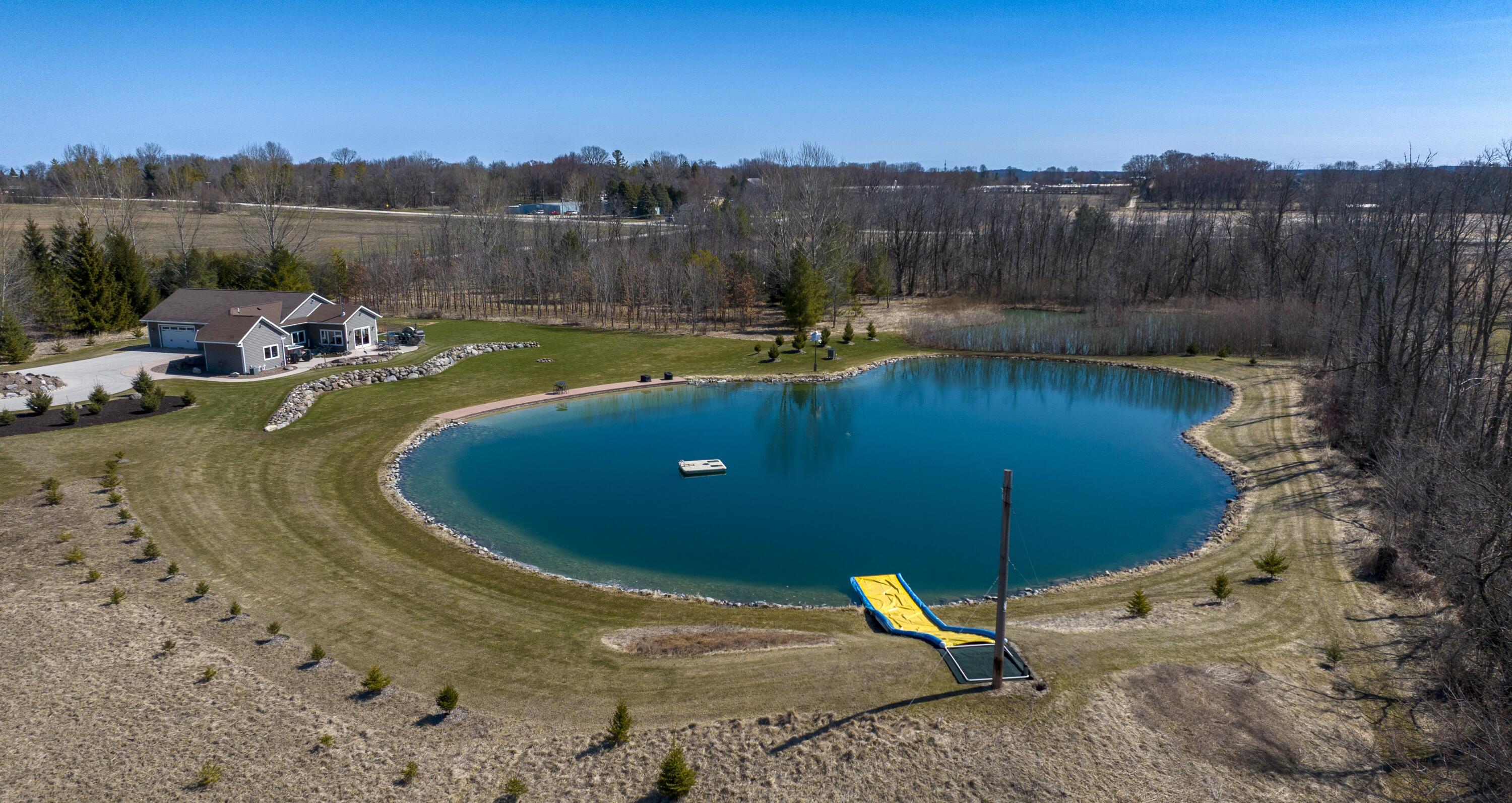 985 Fur Farm Road New Holstein, WI 53061 - Photo 37 of 45 DJI_20260407110718_0503_D