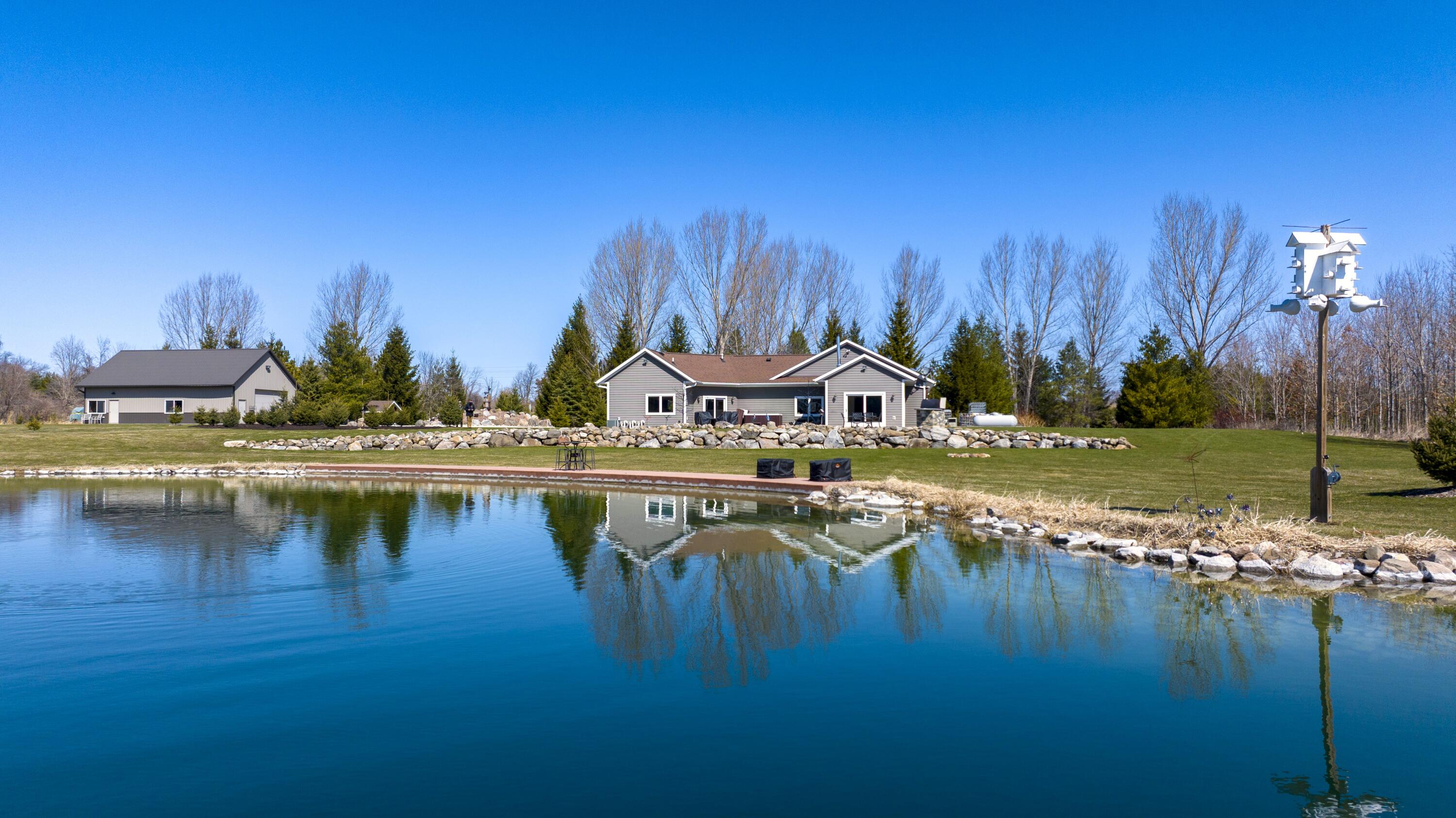 985 Fur Farm Road New Holstein, WI 53061 - Photo 39 of 45 DJI_20260407111430_0530_D (2)