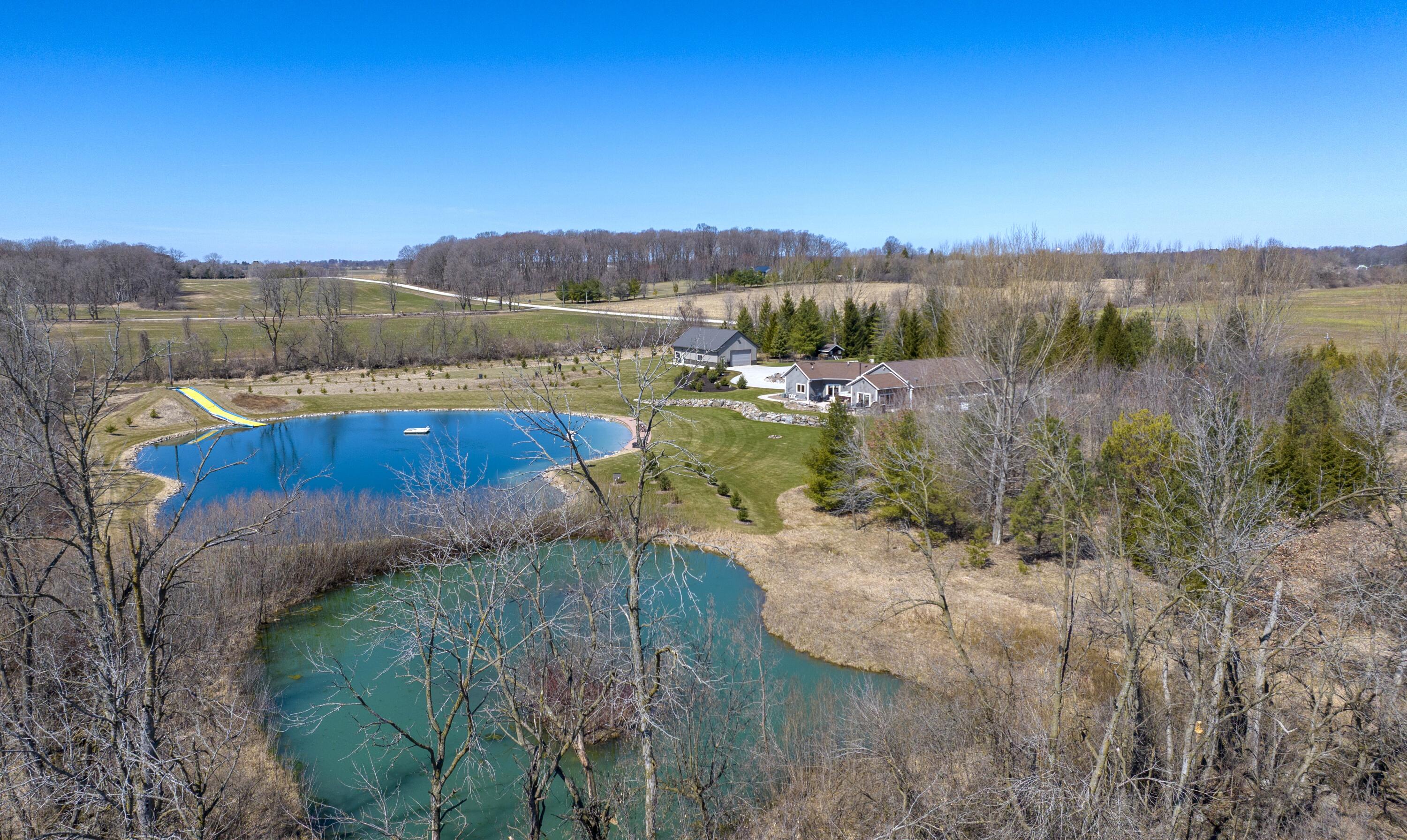 985 Fur Farm Road New Holstein, WI 53061 - Photo 41 of 45 DJI_20260407115526_0602_D (2)