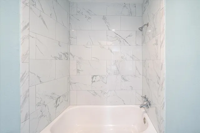 a bathroom with a bathtub