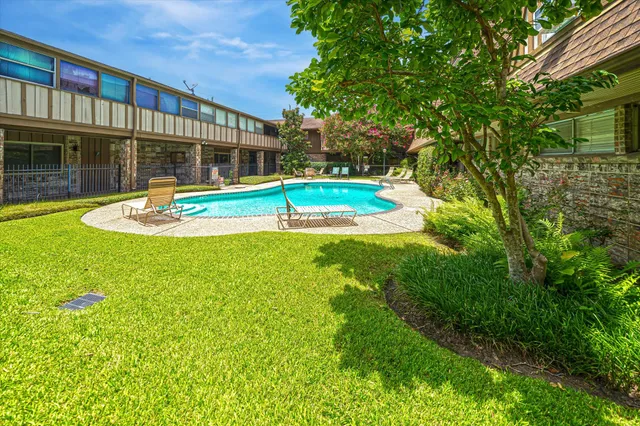 a view of a house with a swimming pool