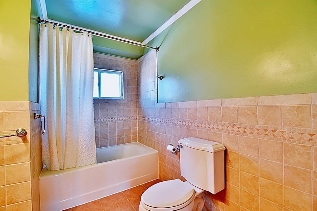 6 Appleton Road Natick, MA 01760 - Photo 33 of 42 a bathroom with a toilet a sink and bathtub